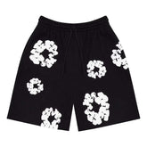 Denim Tears black floral print mesh shorts